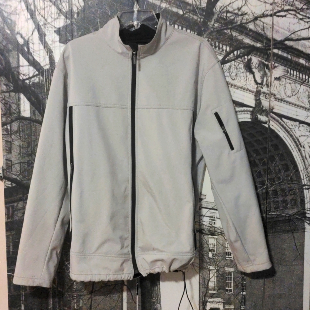 Men's Spring/Fall  Beige Jacket with Black Zipper Pockets.